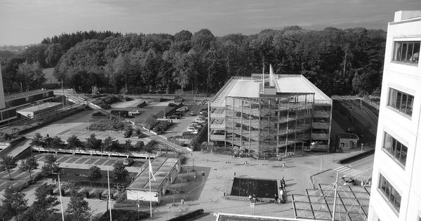 Hospital parking garage entrance with multi-story structure