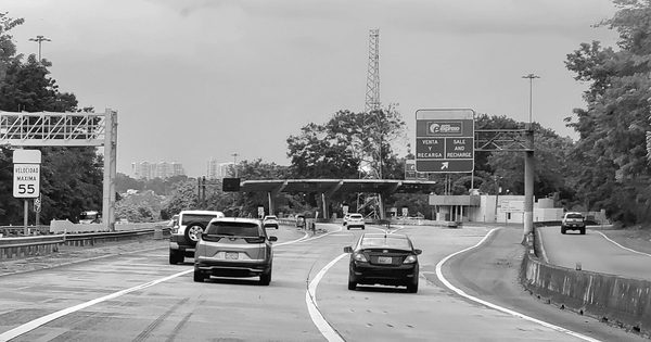 Elevated highway toll plaza exposed to open wind conditions