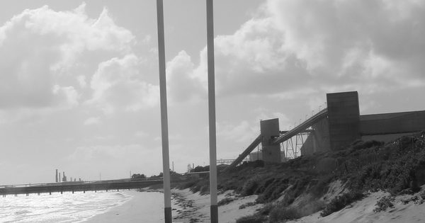 Automatic boom gates at a coastal beach access road