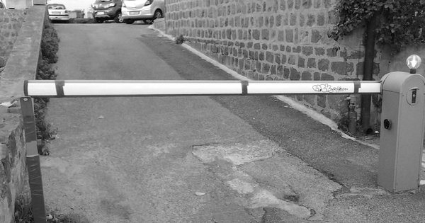 Automatic barrier gate at a residential parking entrance
